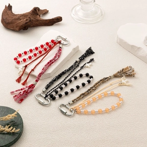 Fashion woven bead keychain with tassels and cross pendant in three vibrant color options