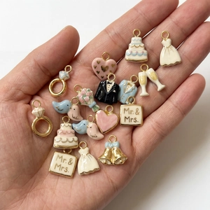 Wedding themed 18K gold plated enamel charms set featuring ring and dress shapes