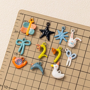 Colorful ceramic style alloy pendants featuring butterfly flower and rabbit shapes