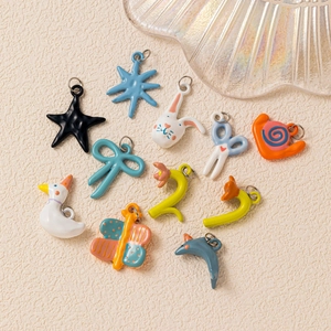 Colorful DIY ceramic alloy pendants in various shapes like stars, rabbits and snails