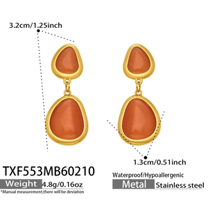 Détails des boucles d'oreilles en acier doré 18 carats avec pierre oeil de chat