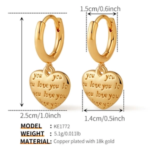 Detail view of 18k gold plated heart earrings showing 2.5cm height and size dimensions