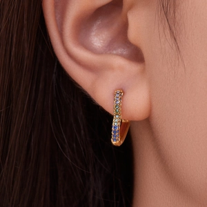 Golden heart huggie earrings with gradient blue cubic zirconia pavé setting for women