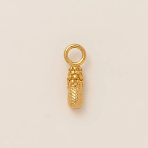 Detail of 18K gold stainless steel pendant with textured granules and hanging loop