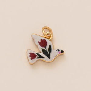 Detailed golden dove charm with tulip flower patterns and an open jump ring for jewelry