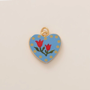 Golden heart pendant with red tulips on blue background and double jump rings