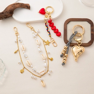 Elegant gold starfish pearl chain and red heart woven pendant bag accessories