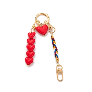 Elegant rainbow woven keychain with red heart beads and golden alloy clasp for handbags
