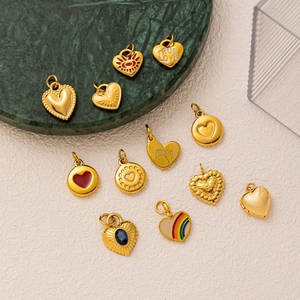 Golden 18k plated stainless steel heart pendants with enamel and crystal details
