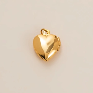 Polished 18k gold heart locket pendant with hinge and top ring for photo storage