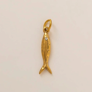 Detailed view of fish pendant with 18K gold plating and hammered texture surface