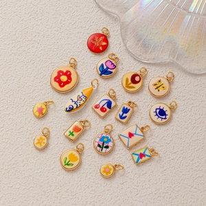 Colorful enamel flower and heart charms in gold finish for DIY necklace jewelry making