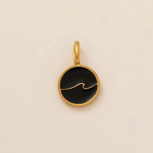 Detailed macro view of 18K gold plated starfish shell charm with black enamel inlay
