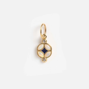 Detailed close-up of 14k gold geometric pendant with blue lapis and white opal stones