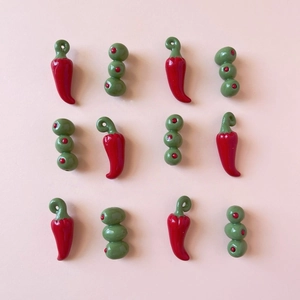 Vibrant vegetable glass charms set with red chili and green olives in 18K gold finish