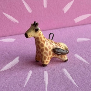 Minimalist colorful giraffe pendant in glazed ceramic with metal loop for accessories