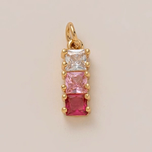 Close-up of three-stone gradient square crystal pendant with gold-plated claw setting