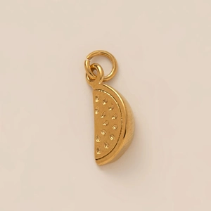 Watermelon slice charm in 18K gold plated stainless steel with teardrop texture details