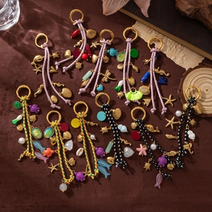 Detailed shot of ocean-themed keychains with starfish pendants and woven ropes