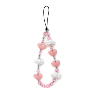 Detail view of pink heart and white cloud beaded phone charm with silver accents