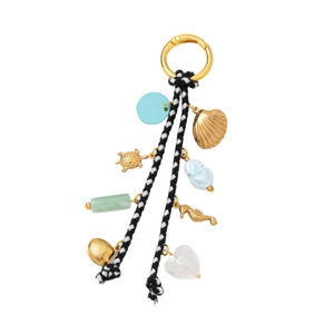 Nautical charm keychain with sea turtle, seahorse, and shell pendants on woven cord