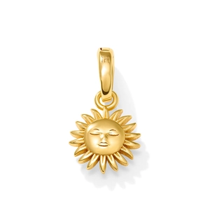 Detailed close-up of a 18K gold-plated sun face pendant with embossed rays and charm loop