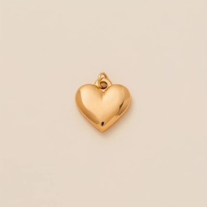 Pendentif cœur doré poli avec finition miroir brillante et design minimaliste chic