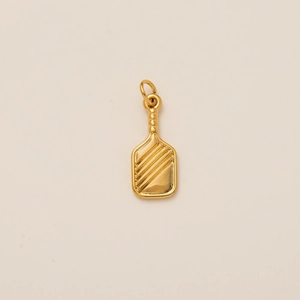 Detailed view of an 18K gold plated pickleball racket pendant with textured surface