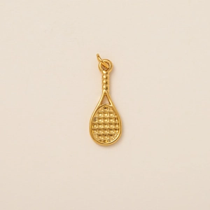 Detailed close-up of a golden tennis racket pendant with mesh texture and spiral handle