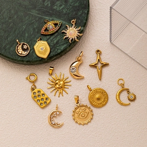 Celestial 18K gold plated stainless steel charms with sun moon and star motifs