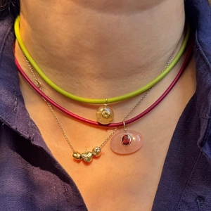 Three-layer stacked necklace set with heart charms, jade-style pendants, and colorful bands
