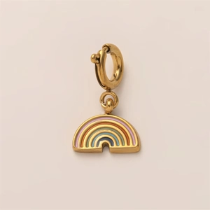 Macro detail of 18K gold plated stainless steel rainbow pendant earring with enamel finish
