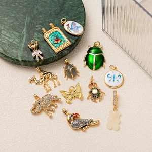 Golden animal charms with cubic zirconia and enamel for jewelry making and DIY crafts