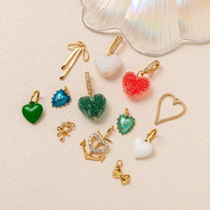 Colorful titanium steel heart and bow pendants with gold plating for keychains