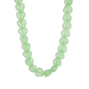 Detail of light green heart-shaped resin beads with a frosted candy texture on a necklace