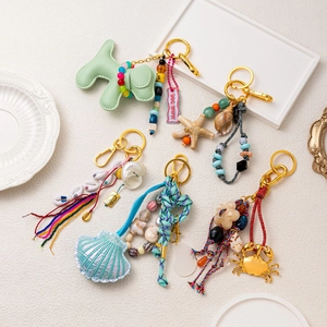 Bohemian style keychain set with leather dog and seashell pendants for bag decoration