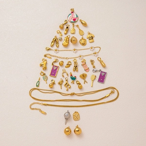 18K gold plated stainless steel sports and music charms arranged in a creative tree shape