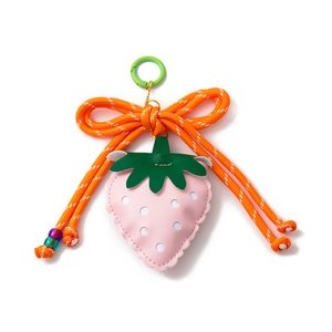Pink faux leather strawberry keychain with orange woven bow and green spring hook