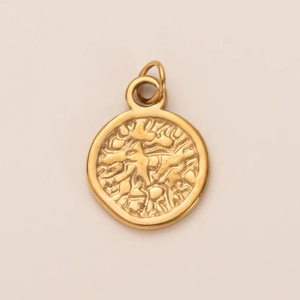 Detailed macro shot of 18K gold plated heart teacup pendant with abstract texture