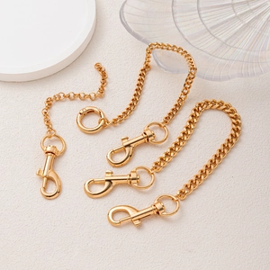 Three premium gold-plated chain bag charms with lobster clasps and rotating rings