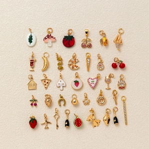 Assortiment de breloques DIY dorées avec formes de fruits en émail pour bijoux