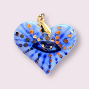 Colgante de corazón azul con diseño de ojo turco y purpurina dorada en cobre bañado en oro