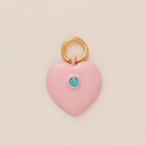 Pink heart-shaped matte pendant with blue rhinestone and golden loop accessory
