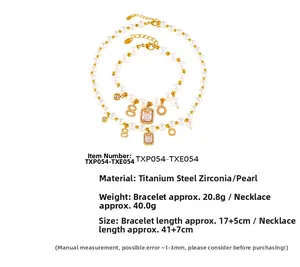Detail of pearl necklace and bracelet set with gold pendants and zircon charms