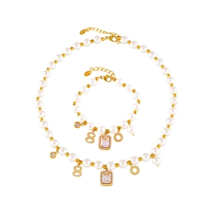 French vintage pearl necklace and bracelet set with golden number pendants and zircon charms