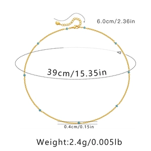 Detail van de 18K vergulde kralenketting met 39 cm lengte en 6 cm verlengketting