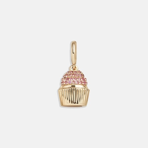 Pendentif cupcake doré avec pierres roses pavées et base plissée réaliste