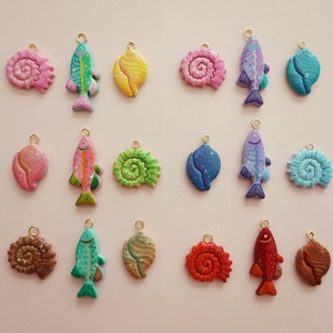 Detailed set of 18K gold-plated ocean fish and shell resin charms for DIY jewelry making