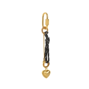Elegant gold heart pendant with black and white woven rope for luxury bag decoration