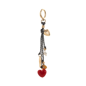 Bijou de sac cœur macaron avec cœur rouge, perle blanche et détail pendentif œil bleu